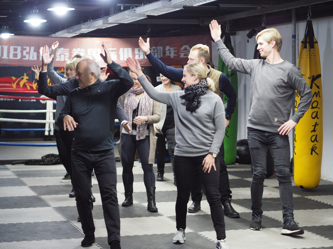 Swedish Guests take Shanghai Tai Chi Class with Master